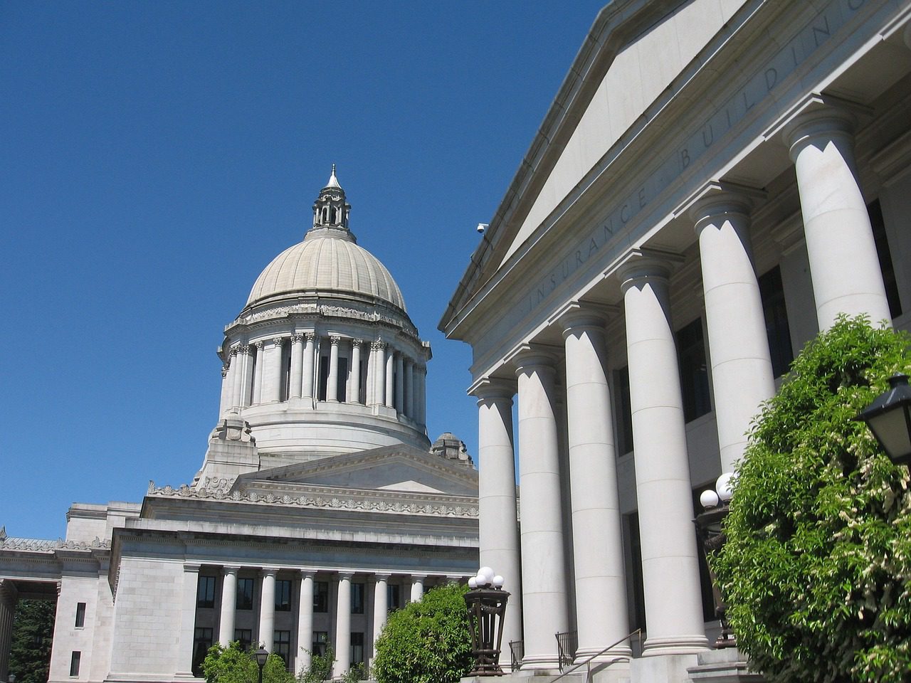 A large building with pillars and a dome.